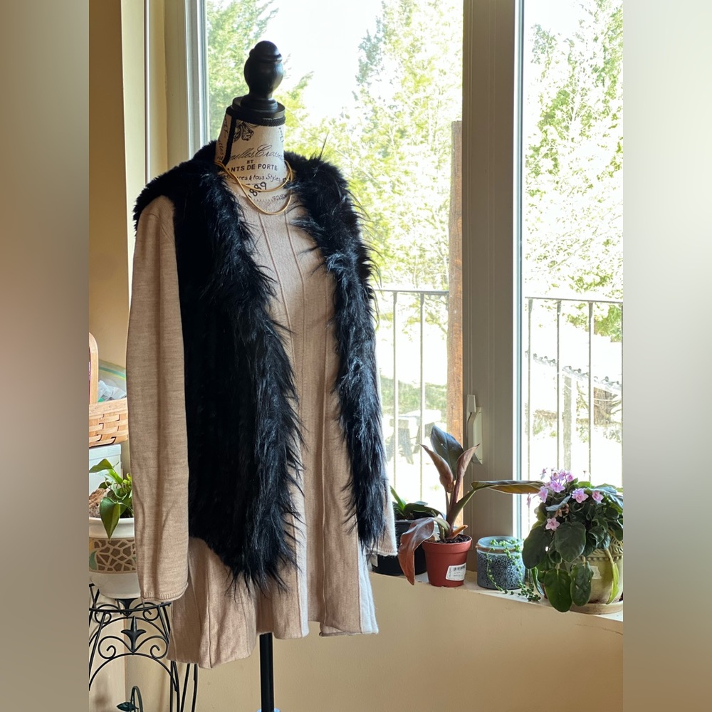 Blue illusion black faux fur vest.